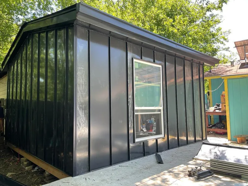 Black standing seam metal wall panels for Roof Inspection in South Lake Tahoe